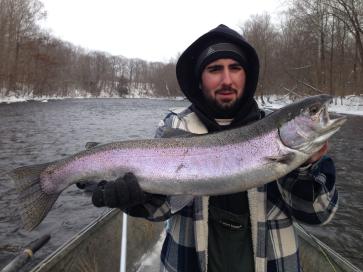 Winter steelhead trout fishing on the Salmon River from a heated drift boat