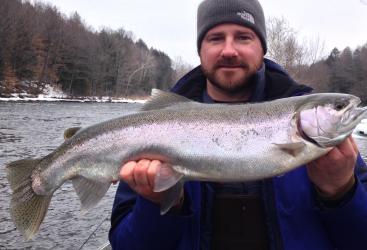 Steelhead trout fishing on the Salmon River in Pulaski NY from a heated drift boat.