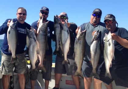 Salmon fishing on the easter basin of lake ontario on a charter boat